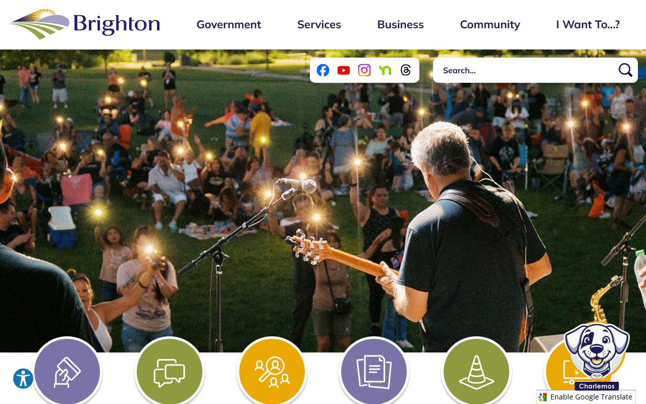Brighton Police Department building and patrol vehicles